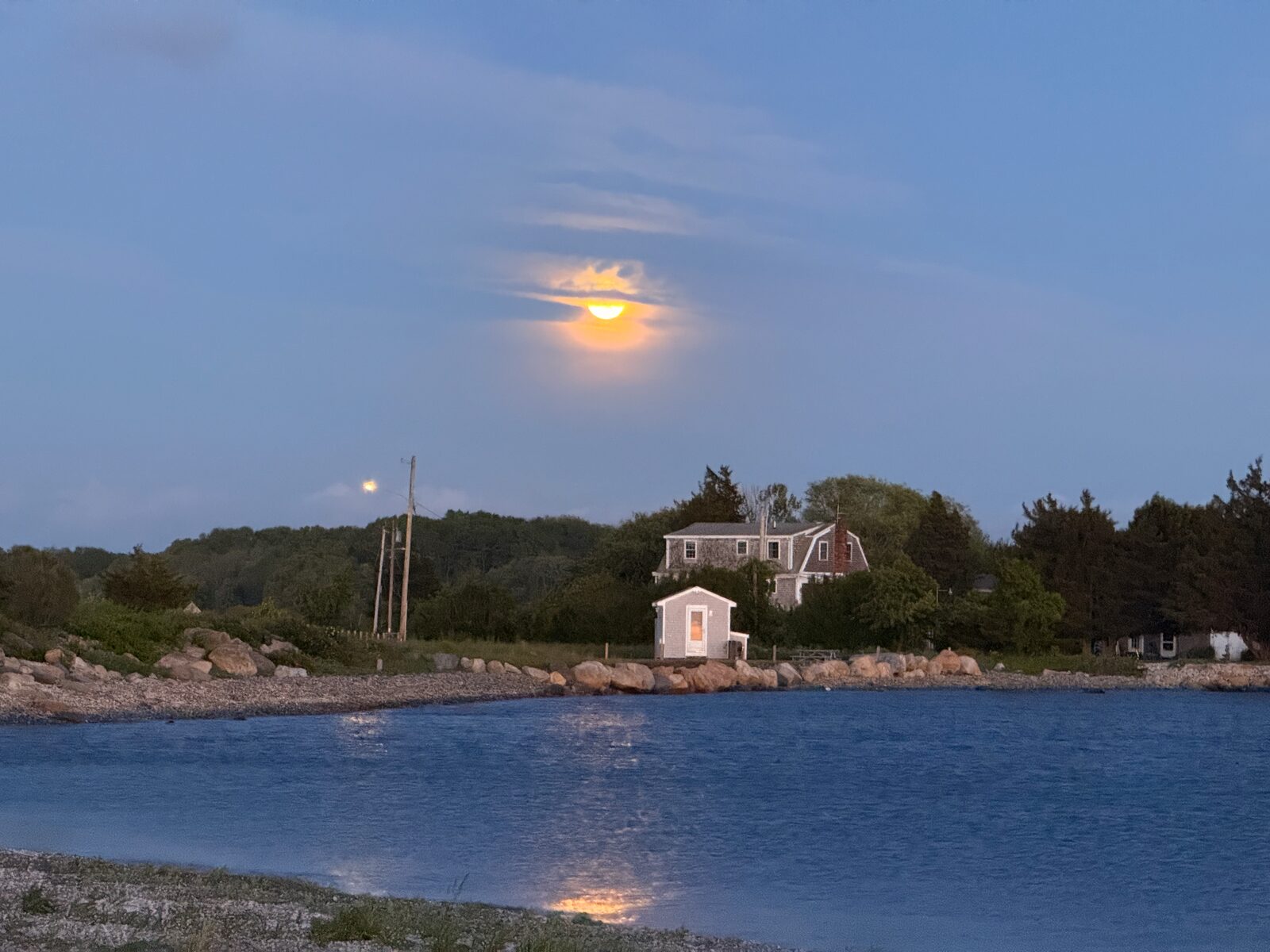 Moon rising over the water after the Sapowet Marsh activation