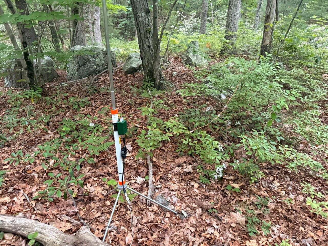 KJ6ER Challenger antenna on a tripod in the woods at Blackstone River Valley National Historical Park