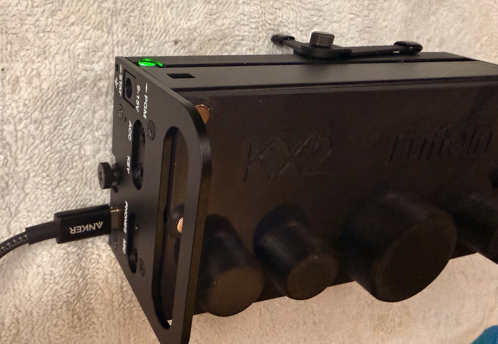 KX2 plugged into USB-C power with the new side rail installed